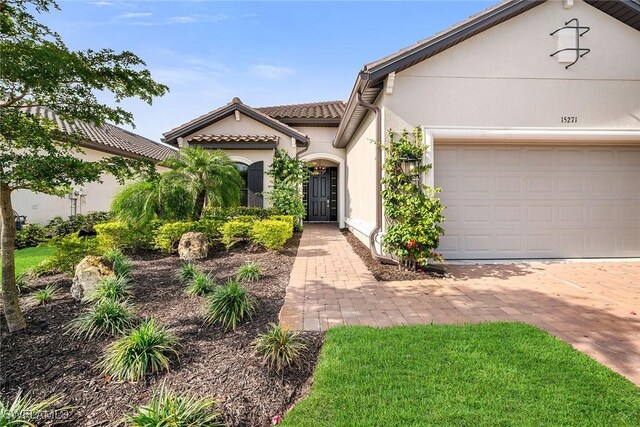 view of front of property with a garage