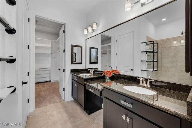 bathroom featuring tile patterned floors and vanity