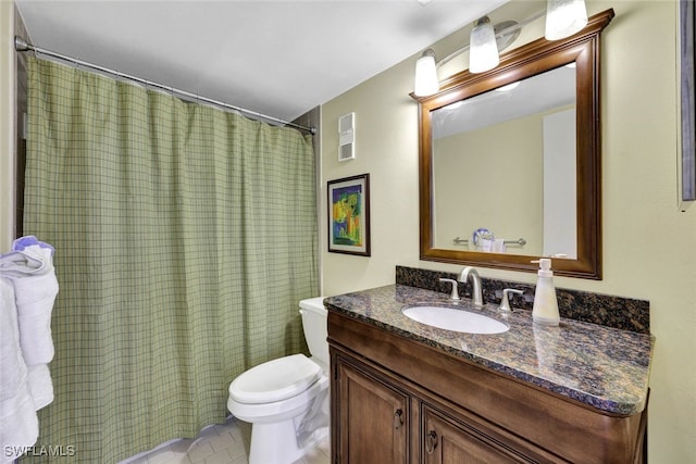 bathroom with curtained shower, tile patterned flooring, vanity, and toilet