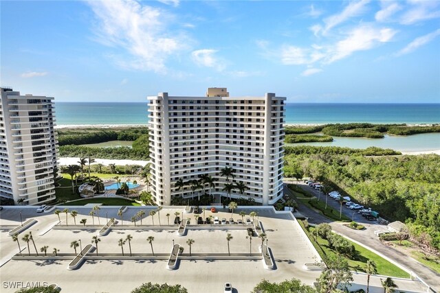 birds eye view of property with a water view