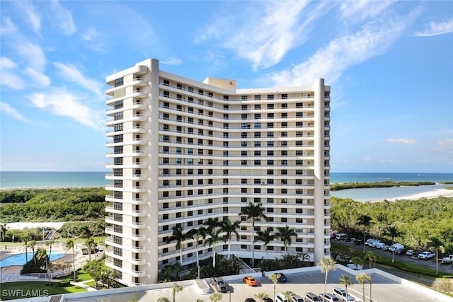 view of building exterior featuring a water view