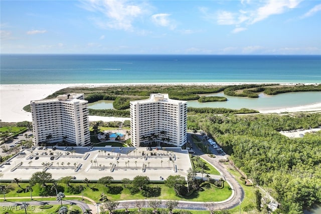 aerial view featuring a water view and a beach view