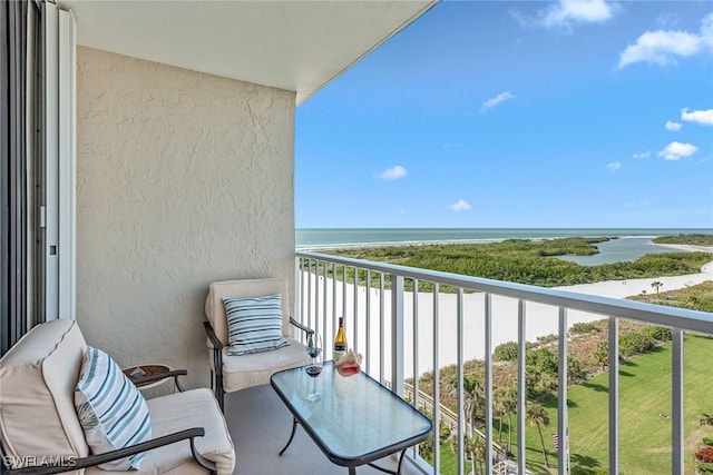 balcony featuring a water view