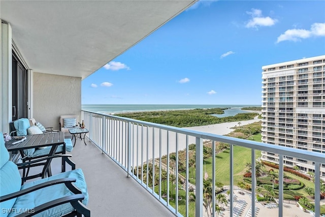 balcony featuring a water view