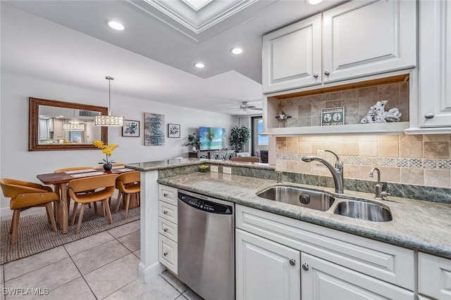 kitchen with ceiling fan, sink, stainless steel dishwasher, decorative light fixtures, and white cabinets