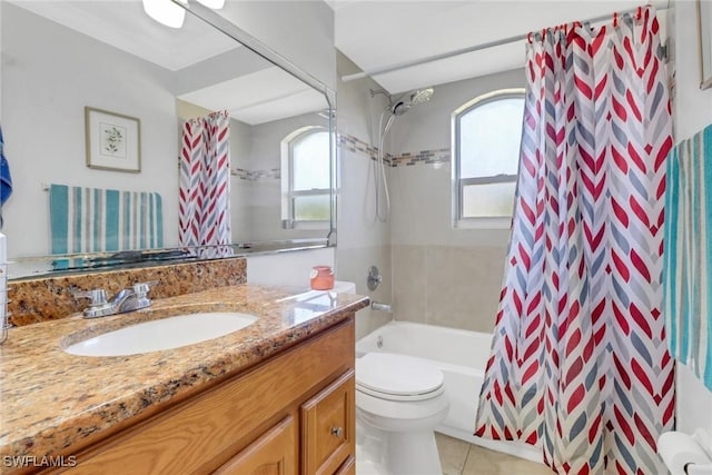 full bathroom with vanity, toilet, tile patterned flooring, and shower / bath combo