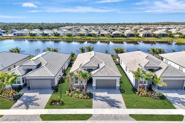 drone / aerial view with a water view