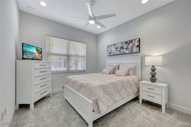 12418 Dahlia Ct, Naples, FL 34120 - bedroom featuring light carpet, baseboards, recessed lighting, and a ceiling fan