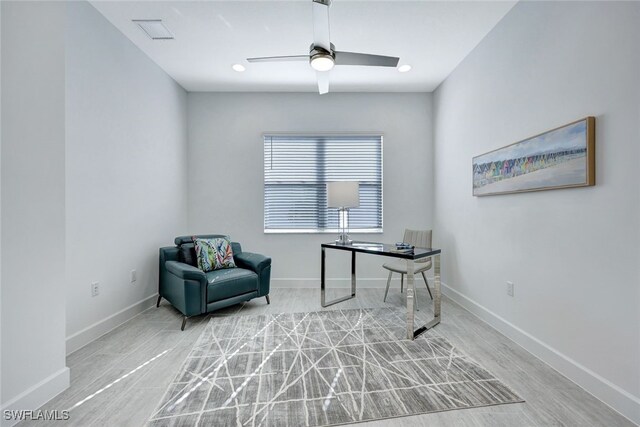 12418 Dahlia Ct, Naples, FL 34120 - office area with ceiling fan, baseboards, and wood finished floors