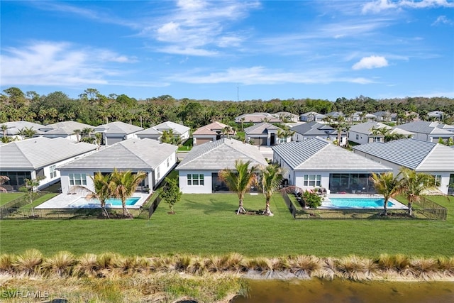 12418 Dahlia Ct, Naples, FL 34120 - aerial view of residential area with a pool and a nearby body of water
