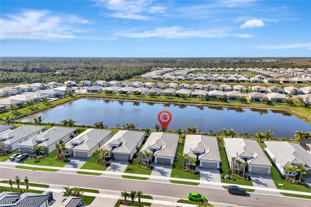 12418 Dahlia Ct, Naples, FL 34120 - aerial view of residential area featuring a large body of water