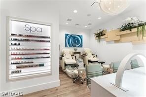 12418 Dahlia Ct, Naples, FL 34120 - interior space with wood finished floors and recessed lighting