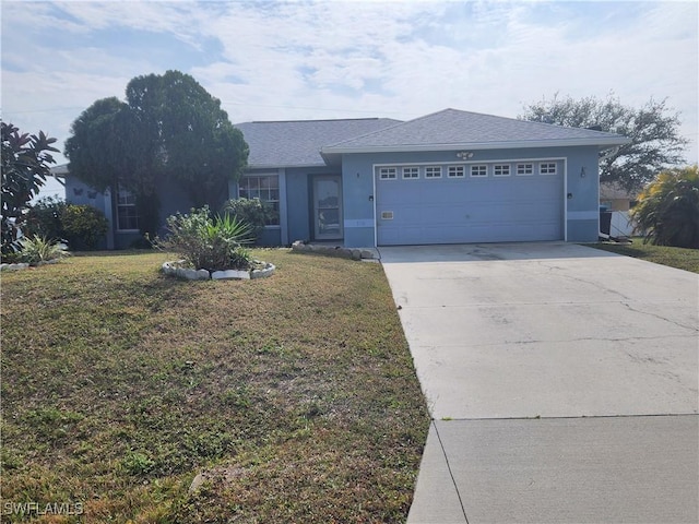 single story home featuring a garage and a front yard