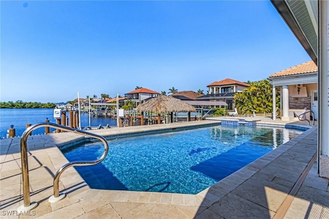 view of pool with a gazebo and a water view