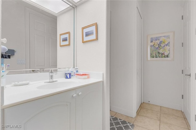 bathroom featuring vanity and tile patterned flooring