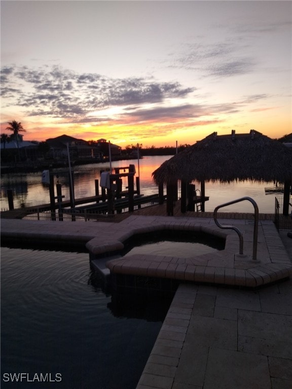 view of dock with a water view