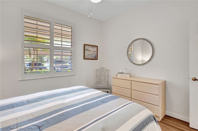 bedroom with light wood-type flooring