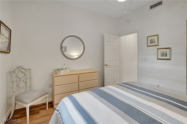 bedroom featuring hardwood / wood-style flooring