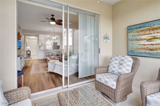 interior space featuring ceiling fan and light hardwood / wood-style floors