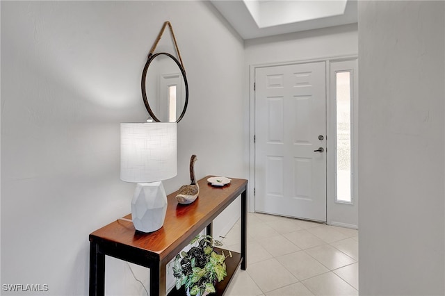 foyer entrance featuring light tile patterned floors