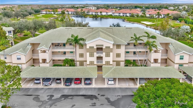 birds eye view of property featuring a water view