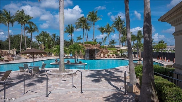 view of swimming pool with a patio area