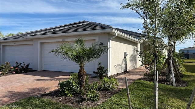 view of property exterior with a garage