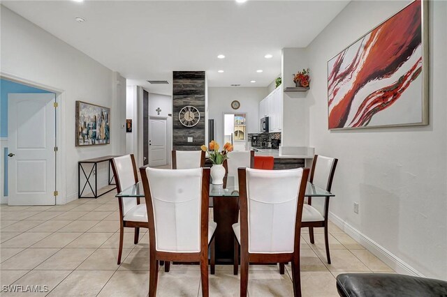 view of tiled dining space