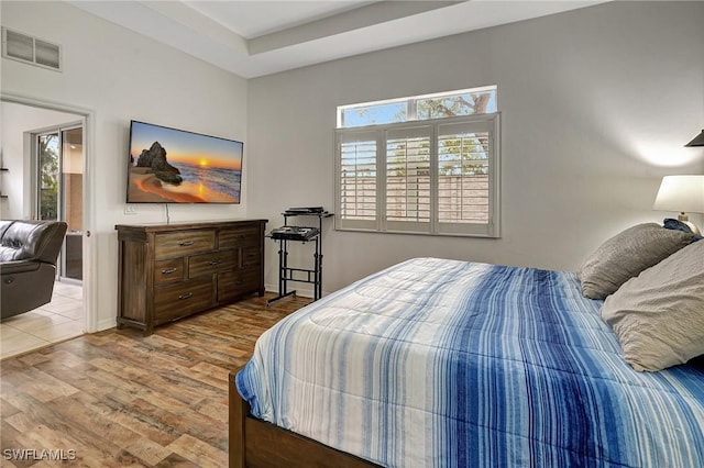 bedroom featuring light wood-type flooring