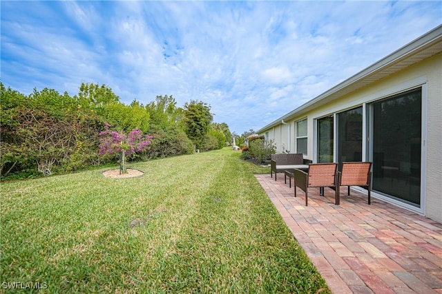 view of yard with a patio area