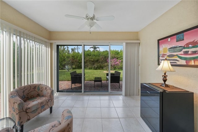 sunroom / solarium with ceiling fan