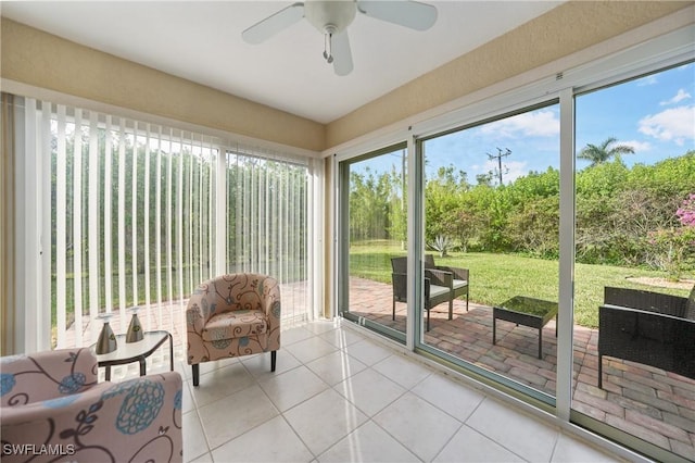 sunroom / solarium with ceiling fan