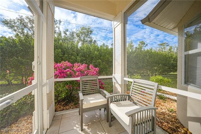 sunroom / solarium with a wealth of natural light