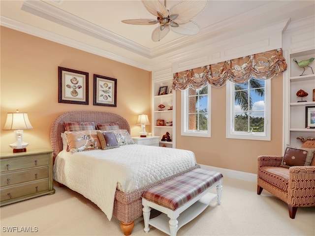 bedroom featuring crown molding, ceiling fan, and carpet flooring