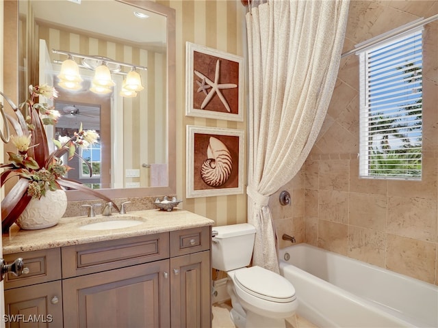 full bathroom with vanity, a healthy amount of sunlight, shower / bathtub combination with curtain, and toilet