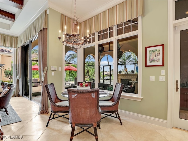 tiled dining room featuring an inviting chandelier and a towering ceiling