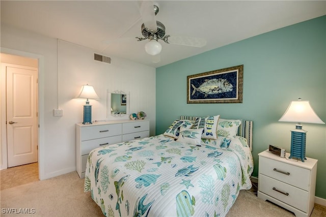 1118 SW 48th Ter Unit 104, Cape Coral, FL 33914 - bedroom featuring light carpet, baseboards, and a ceiling fan