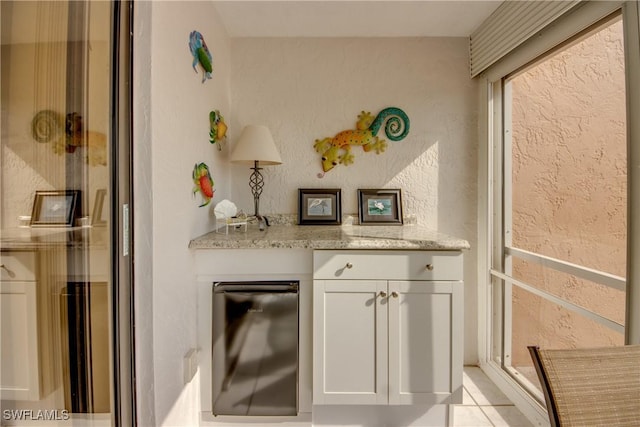 1118 SW 48th Ter Unit 104, Cape Coral, FL 33914 - bar with a textured wall