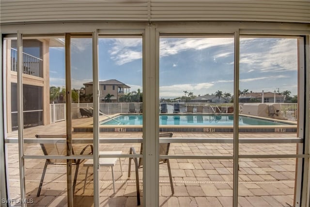 view of swimming pool featuring a healthy amount of sunlight