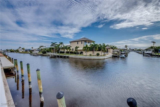 view of water feature with a dock