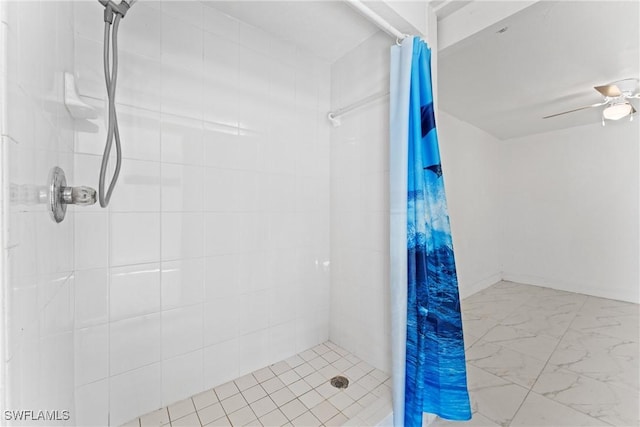 bathroom featuring a shower with curtain and ceiling fan