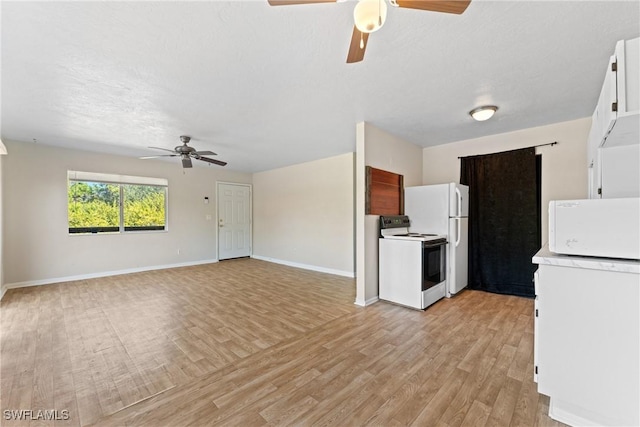 kitchen featuring ceiling fan, white cabinetry, light wood-type flooring, and white appliances