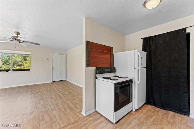 kitchen with ceiling fan, range with electric stovetop, light wood-type flooring, a textured ceiling, and white fridge