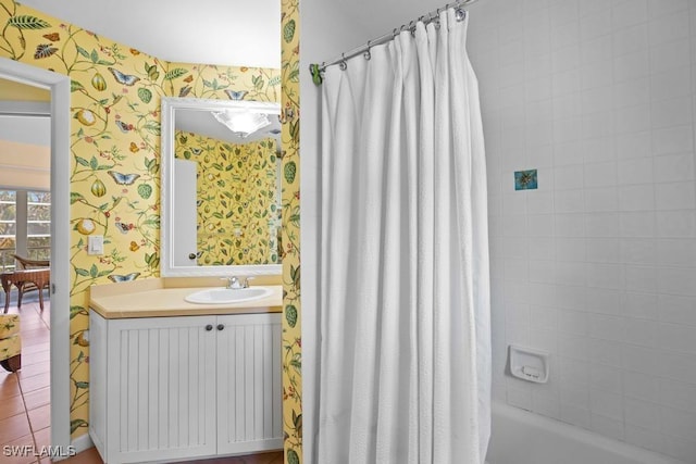 bathroom featuring vanity and shower / tub combo