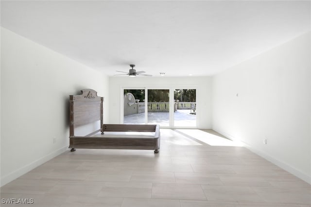 interior space featuring ceiling fan and access to outside