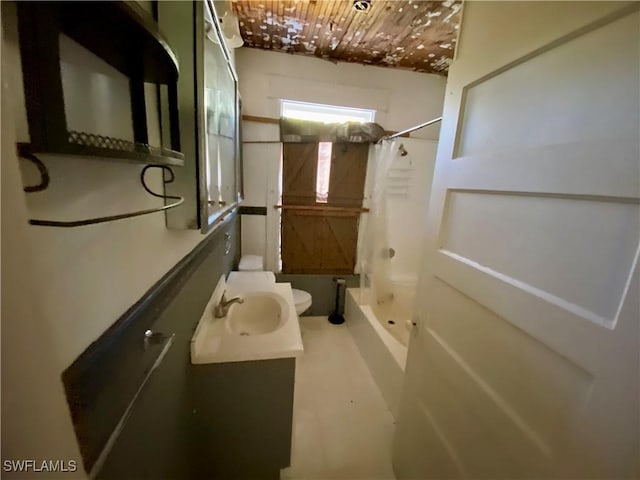 full bathroom with shower / bath combo, toilet, and vanity