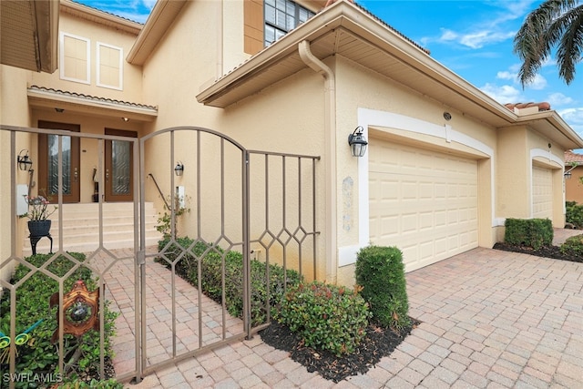 view of property exterior featuring a garage