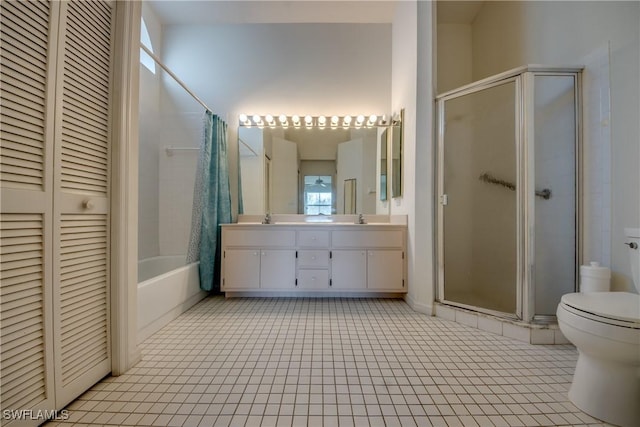 full bathroom with shower with separate bathtub, vanity, and toilet