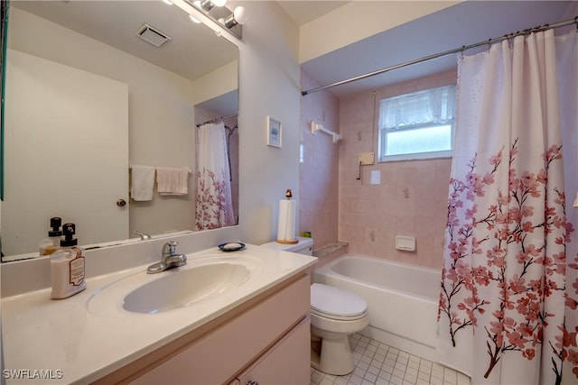 full bathroom with tile patterned floors, vanity, shower / bath combo, and toilet