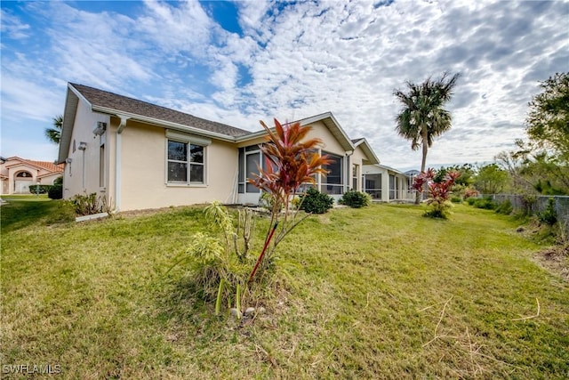 exterior space with a front lawn